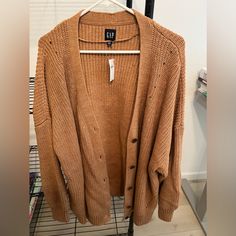 Nwt Beautiful Camel Tan Cardigan. Size Xxl. The Weight Is A Bit Heavy. Item Is More Oversized And Would Easily Fit 3-4xl. No Nearby Gap Store, So I Cannot Return Or Exchange. Gap Outerwear For Fall Layering, Gap Button-up Cardigan For Fall, Gap Long Sleeve Cardigan For Layering, Casual Gap Winter Cardigan, Casual Winter Cardigan By Gap, Casual Gap Sweater For Fall, Gap Long Sleeve Outerwear For Layered Wear, Gap Relaxed Fit Fall Outerwear, Gap Relaxed Fit Outerwear For Fall