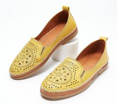 These leather slip-ons boast an intricately designed, perforated upper that demands attention. Whether you choose to wear them with your go-to jeans, a cute maxi dress, or shorts during those warm summer months, they're destined to radiate your sense of style for all to enjoy. From Spring Step. Leather Slip-ons With Woven Sole For Spring, Spring Flat Heel Slip-ons With Perforations, Spring Slip-ons With Perforations And Flat Heel, Spring Perforated Flat Heel Slip-ons, Summer Leather Slip-ons With Perforations, Summer Leather Slip-ons, Leather Slip-ons With Perforations For Summer, Summer Slip-ons With Perforated Toe Box And Flat Heel, Yellow Slip-ons For Summer