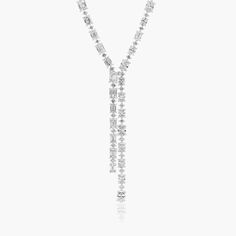 14K White Gold Cascading Lab-Created Diamond Lariat Necklace. Not for the faint of the heart This glorious lab-created diamond lariat necklace is a head-turner! A modern, asymmetrical necklace that features one side of emerald cut diamonds, while the other side has oval cut diamonds. Diamond Solitaire Necklace Long, Luxury Lariat Diamond Necklace For Formal Occasions, Timeless Lariat Necklace For Weddings, Wedding Lariat Necklace With Diamond Cut, Diamond Cut Lariat Necklace For Wedding, Wedding Lariat Necklaces With Diamond Cut, Diamond Cut Lariat Necklaces For Wedding, Diamond Lariat Necklace With Long Drop For Wedding, Diamond Lariat Necklace For Wedding With Long Drop