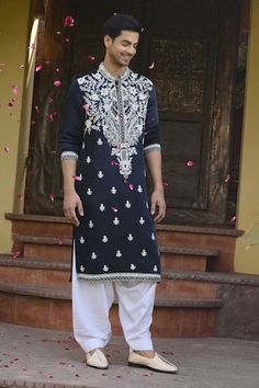 Navy blue kurta with kiran dori work in floral pattern. Paired with an ivory salwar. - Aza Fashions Traditional Drape Kurta With Floral Embroidery For Eid, Chanderi Sherwani With Chikankari Embroidery For Navratri, Floral Embroidered Kurta With Traditional Drape For Eid, Floral Embroidered Kurta For Eid With Traditional Drape, Floral Embroidery Kurta With Traditional Drape For Eid, Floral Embroidered Kurta For Eid, Mulmul Kurta With Floral Embroidery And Traditional Drape, Floral Embroidered Mulmul Kurta With Traditional Drape, Semi-stitched Floral Embroidered Sherwani For Eid