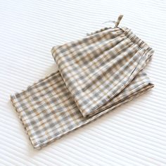 Elevate your loungewear collection with our Plaid Washed Cotton Pajama Pants. Crafted from soft and breathable washed cotton fabric, these pants offer both comfort and style for your relaxation time. The classic plaid pattern adds a touch of timeless charm, making them perfect for lounging around the house or enjoying a cozy night in. With an elastic waistband and relaxed fit, these pajama pants ensure optimal comfort while you unwind after a long day. Treat yourself to the ultimate in comfort a Cotton Pajama Pants, Autumn Lights, Stylish Beds, Plaid Pajamas, Cozy Night, Pj Pants, Charm Making, Pant Length, Pants Blue