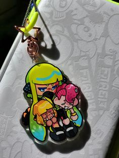 a keychain with a cartoon character on it