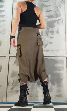 Khaki Trousers With Belt Loops, Baggy Cargo Pants Trousers, Stretch Khaki Cargo-style Bottoms, Khaki Ankle-length Pants With Belt Loops, Baggy Trousers With Side Pockets, Loose Fit Full Length Khaki Pants, Baggy High Waist Khaki Harem Pants, Harem Bottoms With Pockets For Summer, High Waist Harem Pants With Side Pockets