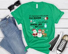 Premium quality, custom adorable Flu Season Shirt. Cute Santa, Snowman, and Reindeer shirt for any health office, medical clinic, school health staff, or other health professional. Perfect Holiday T-Shirt for all health staff! Sizing: - Runs true to retail size, but some people might prefer to size up or down - Please check the size chart added to the pictures - Unisex design is comfortable and flattering for both men and women - Fit style is retail fit* *I would describe this fit as a more tail Infection Control Nursing, Dr Office, Unisex Looks, Reindeer Shirt, School Health, Office Shirt, Christmas T Shirt Design, Health Professional, Nurse Christmas