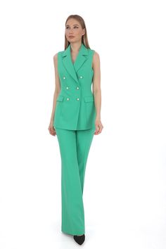 Elevate your formal attire with our Pearl Button Slim Fit Vest Pants Suit, designed to make a statement at any event. This elegant ensemble features a slim fit vest adorned with pearl buttons, complemented by tailored pants for a polished look. Perfect for business meetings, weddings, or special occasions, it combines sophistication with comfort. Crafted from high-quality materials, our suit set ensures a sleek silhouette and durability. The pearl buttons add a touch of luxury, enhancing its app Fitted Pantsuit With Buttons For Office, Tailored Sleeveless Blazer For Parties, Elegant Fitted Pantsuit With Button Closure, Elegant Workwear Pants With Double Button Closure, Elegant Pants For Workwear With Double Button Closure, Elegant Double Button Pants For Work, Elegant Formal Pantsuit With Buttons, Sleeveless Tailored Party Blazer, Chic Tailored Pantsuit With Buttons