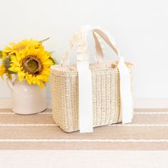 In Stock Fast Shipping from Los Angeles Experience the grandeur of the summertime with the elegantly crafted Elena Handbags Straw Beach Basket. This exquisite basket features intricate detail and durable straw construction, making it the perfect accessory for a stroll on the beach or a sunny picnic. With its timeless appeal, this bag creates a statement of sophistication for any discerning fashionista. Size: 24cm wide x 18cm tall (10in x 7in) Designer Style ID: 8277 Elena Handbags Summer Straw B Basket Handbag, Beach Basket, Designer Style, Sunnies, The Beach, Straw, Angeles, Handbags, Fashion Design