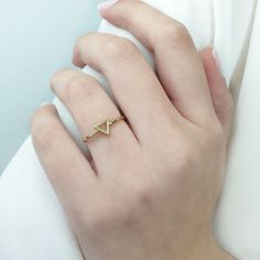 Tiny triangle ring, 9K 14K 18K Solid Gold, Triangle shape ring, Everyday geometric jewelry, Triangle geometric men's, Gold ring gift for her This tiny triangle ring has a minimal design, and you can wear it any day and combine it with other jewelry . It makes for an excellent gift for a loved one, without being extravagant. - Gold Kt: 9K, 14K and 18K Solid Gold - We can make all three Gold Colors: Rose Gold, Yellow Gold, White Gold - Band: 1,2mm ✔ Ready to Ship in 7-10 Business Days Each one of Triangle Ring Design, Gold Trillion Cut Promise Ring, Minimalist Trillion Cut Rings For Anniversary, Gold 14k Trillion Cut Diamond Ring, Minimalist 14k Gold Trillion Cut Ring, Gold Trillion Cut Diamond Ring In 14k Gold, Minimalist Trillion Cut Anniversary Rings, Minimalist Diamond-cut Signet Ring As Gift, Minimalist Diamond Cut Signet Ring For Promise