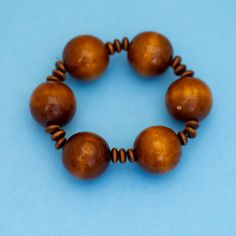 7 inch, Vintage Wooden Ball Beads Bohemian Beaded Bracelet  GENERAL DESCRIPTION Color: Silver Tone Size: 7 inch Material: Wood Last photo includes measurements  If you have any questions please feel free to message me! Cheap Wooden Beads Round Bracelet, Bohemian Beaded Bracelets With 8mm Beads, Brown Bracelets With Large Beads For Festival, Spiritual Polished Beads Bracelets, Bohemian Wooden Beads Stretch Bracelet, Bohemian Brown Bracelets With Large Beads, Brown Bohemian Bracelets With Large Beads, Bohemian Stretch Bracelet With Large Beads, Bohemian Beaded Bracelets With Large Beads