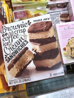 there is a sign that says brownie coffee and ice cream sandwiches on the shelf