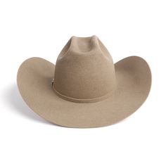 Part of our exclusive Lucchese Western hat collection, the Alamo is a hat that pays homage to the Lone Star State - inspired by the city where Lucchese Bootmaker was founded in 1883 and named after the historical landmark in Texas. The Alamo is 100% custom made and hand-shaped from a blend of the finest beaver nutria furs. A 5 ¾" tapered crown with a slightly modified cattleman's crease and a 4 ½" brim achieve a Western look. A self-band made from its own body are attached with a handmade hat pi Handcrafted Boots, The Alamo, Western Hat, Handmade Boot, Western Look, Historical Landmarks, Lone Star State, Hat Collection, Western Hats