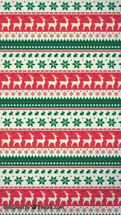 a red and green christmas sweater with deers on it