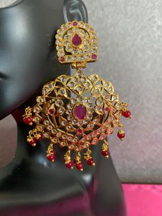 Kundan ruby earrings Red Ruby Dangle Earrings, Festival Celebration Ruby Chandbalis, Pierced Jewelry For Formal Festivals, Formal Jeweled Earrings For Festivals, Formal Pierced Jewelry For Festivals, Heavy Ruby Chandbalis As Gift, Heavy Ruby Chandbalis For Gift, Ruby Chandbali Bridal Earrings For Festivals, Festival Ruby Chandbali Bridal Earrings