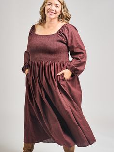 This is a modified version of our Teddy Midi dress, with long sleeves for chillier days. This midi dress features pretty sleeves, an elastic bodice with a flattering fit, and hidden pockets. Cut from a rich, yarn-dyed maroon cotton, this subtle print is a stunner. 100% Cotton Small-batch yarn dyed fabric Hidden pockets Elasticated bodice Length from center front of size 2X is 46" Made fair trade in India by one of our longstanding production partners Pretty Sleeves, Sky Blue Outfit, Plus Size Midi Dress, Sky Clothing, Dress Maroon, Wide Width Shoes, Tunic Sweatshirt, Dress With Long Sleeves, Granola Girl