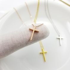 Dainty cross necklace. Christian Religious necklace. Made of solid sterling silver, rhodium, 18k gold, or rose gold plated over sterling silver. Size: 10mm * 16mm Thickness: 3.2mm Hole size: 1.5mm Color: Silver, Gold, Rose Gold Chain: box chain Length of necklace: choose at drop down menu. Dainty Cross Necklace, Necklace Christian, Crucifix Necklace, Religious Cross, Rose Gold Chain, Threader Earrings, Box Chain, Christian Gifts, Jewelry Plate