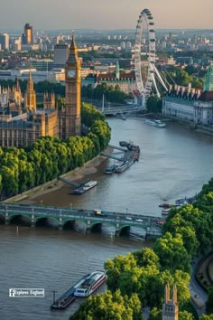 an aerial view of the river thames with big ben in the background and other buildings