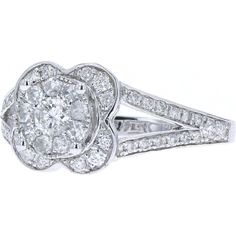 Elevate your style with the epitome of sophistication and elegance: the 14K White Gold Split Shank Diamond Ring. This exquisite piece features a dazzling diamond as its centerpiece, boasting a total weight of 0.88 Carats. Set in luxurious 14K white gold, the brilliance of the diamond is accentuated by the sleek, contemporary design of the split shank band. Whether worn as a symbol of everlasting love or as a statement of individual style, this ring exudes timeless beauty and refined craftsmanship. It's the perfect choice for those who appreciate the finer things in life and seek to make a lasting impression with their jewelry collection.Details: Exquisite Estate Jewelry: Handpicked from history, this pre-owned piece is a treasure of extraordinary rarity and charm. This unique, one-of-a-kin Classic Cluster Diamond Ring In Platinum, Timeless Cluster Diamond Ring In Platinum, Luxury Brilliant Cut Cluster Ring For Wedding, Luxury Brilliant Cut Cluster Wedding Ring, Dazzling Brilliant Cut Cluster Ring For Anniversary, Elegant White Diamond Ring With Diamond Cut, Timeless Platinum Cluster Diamond Ring, Timeless White Gold Cluster Diamond Ring, Classic Platinum Cluster Diamond Ring