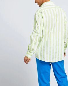 Maxi-striped shirt crafted from breathable 100% cotton canvas, ideal for warm weather. Long sleeves and collar provide coverage while placket details add polish. Bold color stripes make a statement without overpowering. Versatile cut fits comfortably for daily activities or relaxed looks. Wear with jeans or slacks equally; take anywhere from work to weekend. Timeless style enhances any outfit with vibrant pop. Quality Italian construction ensures long lasting wear and washability. Bold Color, Daily Activities, Color Stripes, Sleeve Designs, Classic Shirt, Striped Shirt, Timeless Style, Warm Weather, Men's Clothing