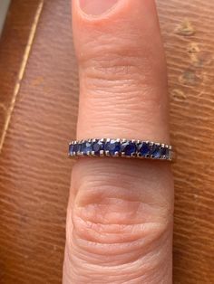 Marked: 750, KC or KO, 2183 / 2233 Front measures: 3.13mm to 2.8mm Band measures 2.71mm to 1.74mm Weight: 3.04 grams Size: 6.5 to 6.75 (in between sizes) Natural blue sapphires, tested by a gemologist. Condition: some light wear, some sapphires have a few chips and abrasion. Metal has some wear. Timeless Hallmarked Sapphire Ring, Round Sapphire Gemstones For Anniversary, Sapphire Gemstones For Anniversary, Classic Sapphire Ring Stamped 14k, Sapphire Rings Stamped 14k, Classic Sapphire Gemstones For Anniversary, Sapphire Ring Stamped 14k Round Cut, Hallmarked Round Sapphire Ring, Hallmarked Classic Sapphire Ring