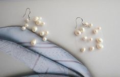 About the design:Selection of natural pearls to ensure quality, pure handmade, handmade meticulous improve the design texture.About the metal:Strengthened fishing line bead bonding process.100%Satisfaction guaranteed customer service.Thanks. Minimalist White Akoya Pearl Earrings, White Pearl Chain Earrings With Round Beads, Handmade Pearl White Pearl Earrings, Handmade Delicate Pearl Earrings, Handmade White Minimalist Pearl Earrings, Handmade Minimalist White Pearl Earrings, Minimalist Handmade White Pearl Earrings, Handmade Baroque Pearl White Earrings, Handmade Baroque Pearl Earrings In Pearl White