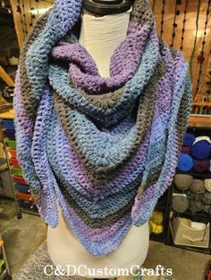 This beautiful Wild Oleander boho hooded scarf will keep you snug and warm all winter long. It is very soft and will fit most adults.  This would make a perfect gift for your loved ones or for yourself. Made with very soft acrylic yarn. Check us out on TikTok! We do lives while making orders. You may see your order being made live. https://www.tiktok.com/@christyrhoadsgeor?_t=8olPCsveu91&_r=1 Poncho Au Crochet, Crochet Hooded Scarf, Winter Poncho, Infinity Cowl, Boho Poncho, Soft Crochet, Hooded Scarf, Crochet Poncho, Shawls And Wraps