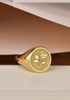 Welcome to LUXJ, Here you will find a beautiful selection of round signet rings with a variety of designs such as our rose flower signet ring. Our team is happy to assist you with any questions you may have and we look forward to creating these special jewelry for you. *The images are taken from us and you will receive your ring as shown* | Information about the ring | - Face Size: 14x14mm - Band width at the bottom: 4mm | Material | - Sterling Silver 925 - Gold Vermail (925 base) - 9K Real Gold Rose Signet Ring, Gold Signet Ring Vintage, Rose Design Flower Promise Ring, Rose Gold Flower Ring For Gift, Rose Colored Round Jewelry For Valentine's Day, Round Rose Jewelry For Valentine's Day, Rose-colored Round Jewelry For Valentine's Day, Rose Gold Rings With Roses For Gift, Flower Shaped Rings With Roses For Gift