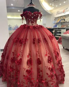 Make a stunning entrance at your quinceanera in this Shimmery Red Off-Shoulder Ball Gown. The A-line silhouette creates a flattering, elegant shape, while the tulle fabric adds volume and texture, making you feel like the center of attention. The off-the-shoulder neckline adds a touch of romantic elegance, perfectly complementing the sleeveless design for a chic and modern look. Adorned with delicate 3D appliqued flowers, this dress brings an ethereal quality that is sure to impress. The gown's Quincenera Dresses Red And White, Red White And Gold Quinceanera Dress, Red Quncie Dresses, White And Red Quince, Pink And Red Quinceanera Dress, Sweet 16 Red And Gold Theme, Quiencera Themes Red, Quinceanera Dresses Red And White, Pink And Red Quinceanera