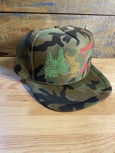 Hat is brand new. Never worn or used. Hat is adult size. Check out pictures to see what you get. Free shipping inside the USA. Hat will be shipped in a box. Camouflage Snapback Hat For Outdoor Activities, Fun Snapback Trucker Hat For Outdoor, Winter Flat Brim Trucker Hat For Outdoor, Winter Trucker Cap For Outdoor Activities, Winter Outdoor Trucker Hat With Flat Brim, Fun Outdoor Baseball Cap With Flat Brim, Trucker Hat With Flat Brim For Camping, Winter Outdoor Trucker Hat With Flat Bill, Winter Trucker Hat For Outdoor