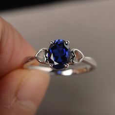 This is a gorgeous handmade creation. Its beauty is its simplicity & Elegance. The 6*8mm oval shape faceted lab sapphire is crafted in solid sterling silver and with rhodium plated. All item is sent in a beautiful gift box If you have any idea of design your ring,pls contact me directly. You can realize more lovely stuff clicking the link https://www.etsy.com/shop/knightjewelry?refshopsection_shophome_leftnav Please leave the correct address and you phone number for delivering successfully. Oval Sapphire Promise Ring, Oval Cubic Zirconia Sapphire Ring Gift, Oval Sapphire Solitaire Birthstone Ring, Oval Sapphire Solitaire Promise Ring, Oval Lab-created Sapphire Ring, Oval Sapphire Birthstone Ring, Oval Solitaire Sapphire Ring With Cubic Zirconia, Elegant Oval Sapphire Birthstone Ring, Oval Sapphire Birthstone Ring In Cubic Zirconia