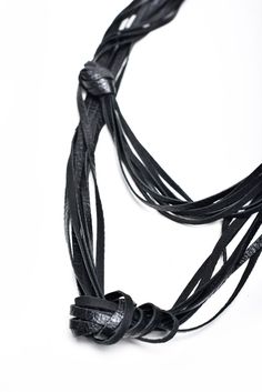 Designers Necklace For Woman, Black Leather Necklace, Modern Long Necklace, Statement Necklace, Black Jewelry, Fringe Necklace, PLIK KNOT LEATHER NECKLACE DESIGN Beautiful knot necklace with smooth and soft lines, made by hand with bright look and attention to each detail. This piece of designer work is truly timeless combination of art and fashion! _ Handcrafted in EU out of the finest Italian leather _ 100% genuine leather _ Stamped PLIK logo _ Closes with adjustable pushstuds at the neck. Sev Handmade Black Leather Necklace, Adjustable Leather Evening Jewelry, Elegant Black Leather Necklaces, Handmade Black Necklaces As Fashion Accessory, Handmade Black Necklace Fashion Accessory, Elegant Black Leather Necklace, Edgy Black Adjustable Necklaces, Adjustable Leather Party Necklaces, Adjustable Leather Party Necklace