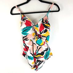 Beach Betty By Miracle Brands One Piece Swimsuit Floral Colorful White M New With Tags! Armpit To Armpit: 12.5" Length: 26.5" Comes From A Smoke Free Home. Feel Free To Ask Any Questions You May Have. Thanks For Looking! Beachy Multicolor V-neck Swimwear, Casual Multicolor Floral Print Swimwear, Beachy V-neck Multicolor Swimwear, Casual Multicolor One-piece Swimwear, Multicolor V-neck Swimwear For Spring, Swimsuit Floral, Navy Swimsuit, Black And White One Piece, Tank Swimsuit