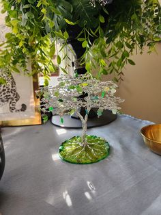 a bonsai tree sitting on top of a table