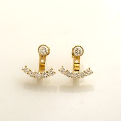 Ear jacket diamond earrings - Made in 14k or 18k yellow gold. The ear jacket is set with 5 diamonds on the back and a stud on the front. - The earrings can be purchased without the studs. This listing is for YELLOW GOLD. you can order other colors from the following links: ● Rose gold - https://www.etsy.com/listing/1122268012/ ● White gold - https://www.etsy.com/listing/1136224747/ ♦ DIAMONDS SPECIFICATIONS ♦ Pieces: 12 (2 studs & 10 on each) Total Carat Weight: 1.10 CT (0.20ct each stud + 0.35c Earrings Diamond Studs, Diamond Earring Jackets, Studs Diamond, Yellow Gold Diamond Earrings, Jacket Earrings, Ear Jacket Earring, Studded Jacket, Earring Jackets, Ear Jacket