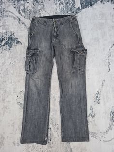 Tag ~ wrangler material ~ cotton made in ~ china size ~ 28 waist ~ 28 length (outseam ) ~ 40 inseam ~ 30.5 hip ~ 37 thigh ~ 24 front rise ~ 10.5 back rise ~ 15 leg opening ~ 16  condition  ~ good used all measurement are in inchies. for all customers please read carefully about the item detail before you  purchase any item all items is used and don't expect it in perfect condition. shipping we are using dhl express, it takes 3-5 days only to arrive. please leave your phone number on the note while make a purchase. Vintage Cotton Cargo Jeans With Multiple Pockets, Vintage Straight Leg Cargo Jeans, Dark Wash Full-length Cargo Pants With Hip Pockets, Vintage Cotton Cargo Jeans With Side Pockets, Vintage Dark Wash Cargo Bottoms, Vintage Cargo Jeans With Pockets In Dark Wash, Vintage Dark Wash Bottoms With Cargo Pockets, Vintage Straight Leg Cargo Jeans With Side Pockets, 90s Straight Leg Cargo Jeans With Cargo Pockets