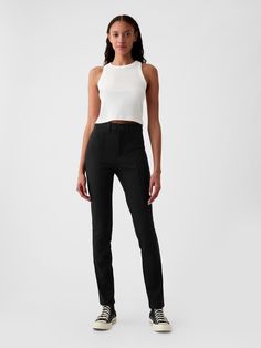 Soft stretch skinny pants.  Zip fly, snap-button closure.  Pintuck seam at front.  Back welt pockets.  High rise.  Comfortable and well-fitting in waist and hip, slim throughout the leg Model is approx.  5’10” wearing Casual Fitted Bottoms With Seam Detailing, Slim Fit High-waisted Elastane Bottoms, Chic Mid-rise Pants With Seam Detailing, Mid-rise Fitted Pants For Business Casual, Fitted Mid-rise Business Casual Pants, Fitted Mid-rise Pants For Business Casual, Chic Fitted Bottoms With Seam Detailing, Straight Leg Workwear Leggings, Chic High Rise Gap Bottoms