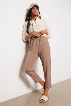 Step up your weekend style with the Cypress Turnup Taper Pant from Varley, featuring a high-rise fit, an elastic waistband with an adjustable drawstring, and an ankle length hem with a cuff. Trendy Paperbag Waist Pants With Elastic Waistband, Relaxed Fit Pants With Gathered Waist For Spring, Elevated Casual Elastic Waistband Bottoms For Fall, Elevated Casual Bottoms With Elastic Waistband For Fall, Elevated Casual Fall Bottoms With Elastic Waistband, Relaxed Fit Paperbag Waist Workwear Pants, High Waist Pull-on Pants For Elevated Casual, Relaxed Fit Elastic Waistband Fall Pants, Relaxed Fit Paperbag Waist Pants For Work