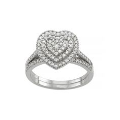 Featuring a heart motif adorned with tiers of round-cut diamonds, this sterling silver engagement ring set is a stunning representation of your devotion. Featuring a heart motif adorned with tiers of round-cut diamonds, this sterling silver engagement ring set is a stunning representation of your devotion.Click on this JEWELRY & WATCHES GUIDE to learn about fit, styles, materials and more! Includes: engagement ring & matching wedding band Width: 10 mm Metal: sterling silver Plating: rhodium Fini Silver Engagement Ring Set, Engagement Ring Matching Wedding Band, Heart Engagement Ring, Heart Engagement, Ring Matching, Silver Engagement Ring, Heart Engagement Rings, Heart Motif, Sterling Silver Engagement Rings