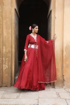 Featuring Maroon  silk anarkali with beads, dabka, mirror, zari work on sleeves paired with detachable belt and organza dupatta. Fabric - Silk, Organza Components - 3 Colour - Maroon Embroidery details - Hand Embroidery Delivery time - 2-3 weeks Washing Instructions - Dry-clean Anarkali Set With Sheer Dupatta In Chinon, Anarkali Floor-length Kundan Dupatta, Anarkali Choli With Sheer Dupatta In Chanderi, Anarkali Raw Silk Floor-length Palazzo Set, Floor-length Organza Palazzo Set With Cutdana, Floor-length Kundan Anarkali Set With Mirror Work, Floor-length Raw Silk Palazzo Set With Gota Work, Traditional Floor-length Chanderi Palazzo Set, Organza Anarkali Set With Cutdana