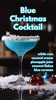 blue christmas cocktail with coconut cream, pineapple flakes and blue curacao