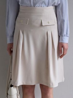 This soft skirt with the perfect pop of pretty.This skirt is a polished approach to a little glam for every day.You will be more stylish in this skirt. - Regular fit midi skirt- Back zip closure- It looks as good in the office as it does out- Lined skirt, so it's soft and comfy - This one features a front faux welt pocket and pleated design Chic Pleated Mini Pencil Skirt, Chic Pleated Hem Mini Skirt, Elegant Spring Skort, Chic Skirted Skort With Pockets, Elegant Skort With Pleated Hem, Elegant Fitted Skort With Gathered Skirt, Chic Flared Pleated Skort, Elegant Skort With Pleated Flared Hem, Elegant Skort With Pleated Flared Skirt