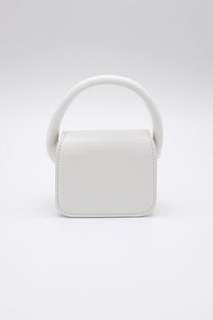 Bethany Micro Mini Bag This product has been hand-picked by Storets' stylists. White Bag With Adjustable Handle For Daily Use, White Rectangular Bag With Top Carry Handle, White Square Bucket Bag, Cream Rectangular Bag With Adjustable Handle, White Box Shoulder Bag With Handles, White Square Bags With Detachable Handle, Cream Shopping Bag With Adjustable Handle, White Tote Box Bag With Top Carry Handle, White Rectangular Bucket Bag