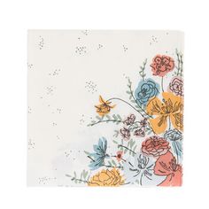 a napkin with flowers on it and a bird flying in the sky over it's head