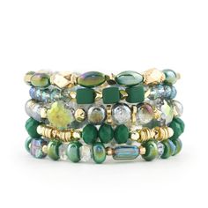 Expertly designed with stunning green beads and gold accents, the Polished Pine Stack is a vibrant and eye-catching bracelet stack. Perfect for adding a touch of color and elegance to any outfit, this stack is a must-have for any accessory collection. Lead & Nickel Free All separate pieces Bracelets are 'one size fits most' and are designed to fit wrists up to 7.5" comfortably. Please be aware that due to the unique and handmade nature of each product, colors, shapes, and bead sizes may vary sli Stacked Bracelets, Bracelet Stacks, Dress Purse, Bead Sizes, Green Beads, Free Bracelet, Bar Bracelets, Name Bracelet, Custom Bracelets