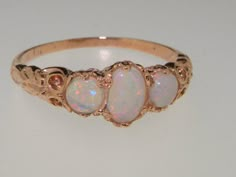 9K Rose Gold Genuine Colorful White Opal Ring by GemsofLondon Rose Gold Heirloom Three Stone Rings, Heirloom Rose Gold Three Stone Rings, Classic Three-stone Opal Ring For Wedding, Oval Three-stone Opal Ring, Oval Three Stone Opal Ring, Australian Opal Ring, 3 Stone Ring, White Opal Ring, Precious Opal