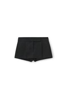 Mini skort with tailored waistband in black wool tailoring. Fitted low waist. Hem hits at high thigh. Hidden zip front fly closure. Back welt pockets. Composition: 100% wool. Lining: 100% polyester. Made in china. Model is 5' 11" and wears a size s. 1WC3235272001. Elegant High Waist Skort With Built-in Shorts, Elegant Mini Skort With Built-in Shorts, Elegant Mini Skirt With Built-in Shorts For Work, Elegant Fitted Mini Skirt With Built-in Shorts, Chic Formal Shorts With Short Inseam, Black High-waisted Shorts For Formal Occasions, Elegant Black Shorts For Office, Elegant Black Office Shorts, Elegant Formal Black Shorts