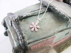 "Lovely enamel flower in pink sterling silver necklace. The chain is a diamond cut chain.   It is ideal gift for your adorable girl.  Made of good quality solid 925 sterling silver; Brand: ANKA; Length: 13, 14, 15, 16 inches available; Pendant: 1*1.6cm; \"925\" stamped; Colour as shown; In Gift Box Packing; Cleaning and polishing with sterling silver cloth after wear  Visit our etsy shop for more kid's sterling silver jewelry and also personalized sterling silver chokers and many other sterling silver everyday jewelry items. https://www.etsy.com/shop/charmplus" Cute Pink Flower Pendant Jewelry, Dainty Pink Pendant Flower Necklace, Pink Flower Charm Necklace For Gift, Pink Flower Necklace For Gift, Pink Flower Necklace For Gifts, Pink Sterling Silver Flower-shaped Jewelry, Pink Flower Charm Necklace With Flower Pendant, Silver Flower Necklace With Charm For Birthday Gift, Cute Pink Sterling Silver Necklaces