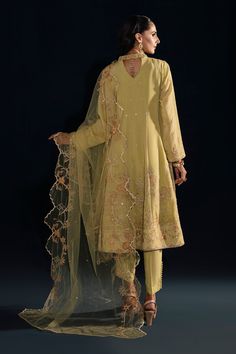 Lemon Green Embroidered Pakistani Party Wear Frock Trousers Dupatta is skillfully crafted pear green kalidar frock is adorned with machine embroidery, hand embellishments, minimal lace details & machine embroidered panels with motif spread on the neckline, front, back & sleeves. Outfit is paired with button detailed straight pants & machine embroidered dupatta with two sided scalloped borders. Frock: An enchanting frock in blush color tailored on a black canvas with heavily embroidered borders w Sleeves Outfit, Party Wear Frocks, Pakistani Party Wear, Embroidery Hand, Net Dupatta, Sequins Embroidery, Make Color, Blush Color, How To Dye Fabric