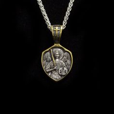 "Saint Michael silver and gold pendant, Religious necklace   Miraculous medal bulk silver pendant, icon with a prayer Archangel Michael, silver healing jewelry for men, Saint Michael Necklace, Police, Military Gift for Him or Her, Unisex, Archangel Michael Necklace, Catholic Can be for a child or an adult. Pendant dimensions: Height - 2.3 cm 0.9 inches Width -1.2 cm 0.39 inches Average Weight - 2.4g  The silver pendant is made of 925 sterling silver and plated with 999 gold. On the front side of the pendant there is an image of the Archangel Michael, on the back there are words from the prayer \"Holy Archangel Michael of God, pray to God for us.\" The amulet protects a person, therefore the person wearing the amulet should treat it with care. Saint Michael the Archangel isn't a saint, but Silver Spiritual Medallion Necklace Gift, Spiritual Silver Medallion Pendant Necklace, Spiritual Style Silver Medallion Necklace With Large Pendant, Silver Spiritual Medallion Necklace With Large Pendant, Spiritual Silver Medallion Necklace With Large Pendant, Silver Byzantine Sterling Silver Necklace, Silver Medallion Amulet Necklace With Charms, Silver Spiritual Charm Necklace With Large Pendant, Silver Amulet Medallion Necklace With Charms