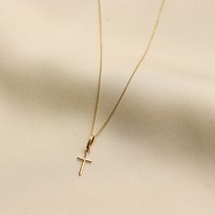 Gold KT: 14K Solid Gold Gold Color: Yellow Gold Chain Style: Rolo Chain Length: 16", 18" Chain Width: 1 mm Minimalist 14k Gold Cross Pendant Necklace, Gold Cross Pendant Necklace With Cable Chain, Gold Cross Pendant Necklace On Cable Chain, Gold Necklaces With Cross Pendant And Cable Chain, Gold Necklace With Cross Pendant And Cable Chain, Gold Cross Pendant With Cable Chain, Gold Cross Pendant Cable Chain Jewelry, Gold Cross Pendant Jewelry With Cable Chain, Yellow Gold Cross Necklace With Clavicle Chain