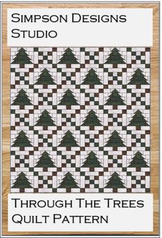 the book cover for through the trees quilt pattern, which is designed by simpson designs