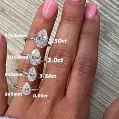 a woman's hand with four different rings on her fingers and the measurements for each ring